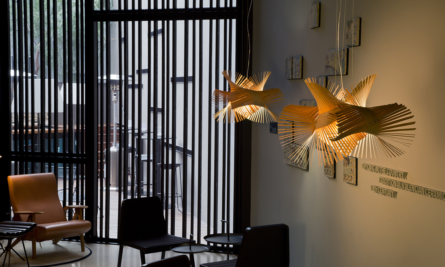 LZF Lamps | Minimikado, Suspension Lamp. Caro Hotel Bar | Wood touched by Light | Handmade Wood Lighting since 1994