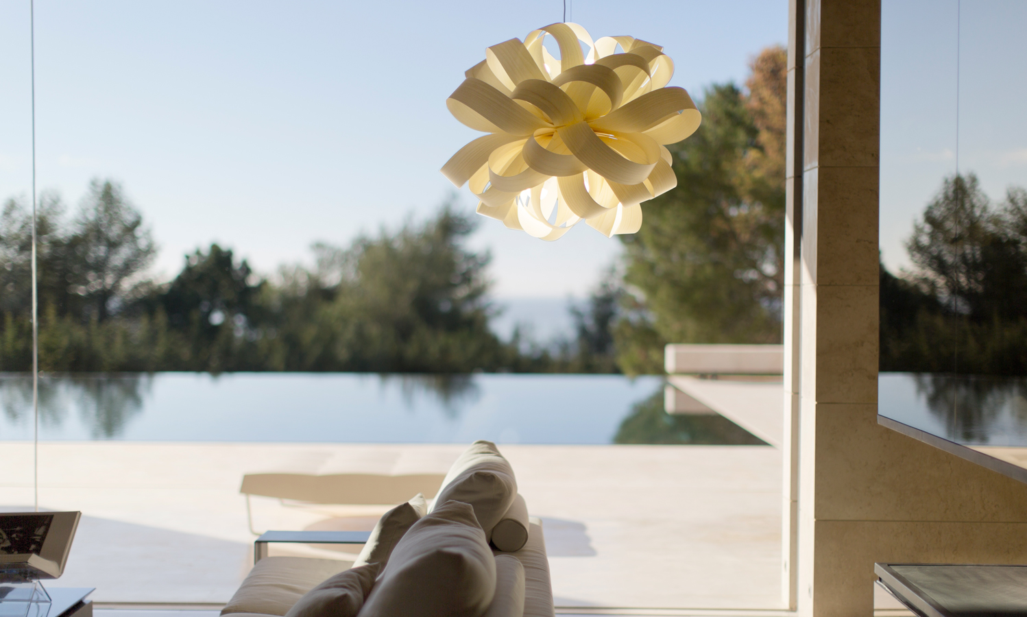 LZF Lamps | Agatha, Ball Suspension Lamp. Elegant poolside living, by A-cero Architects | Wood touched by Light | Handmade Wood Lighting since 1994