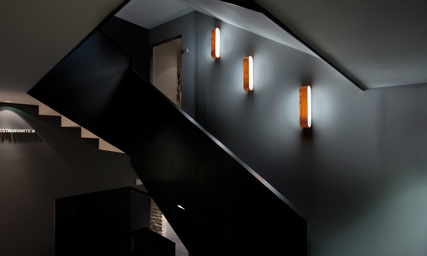 LZF Lamps | I-Club, Small Wall Lamp. Caro Hotel Stairs | Wood touched by Light | Handmade Wood Lighting since 1994
