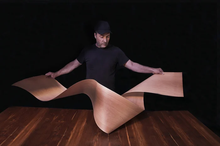 Hand-shaped flexible wood veneer treated with Timberlite® technology