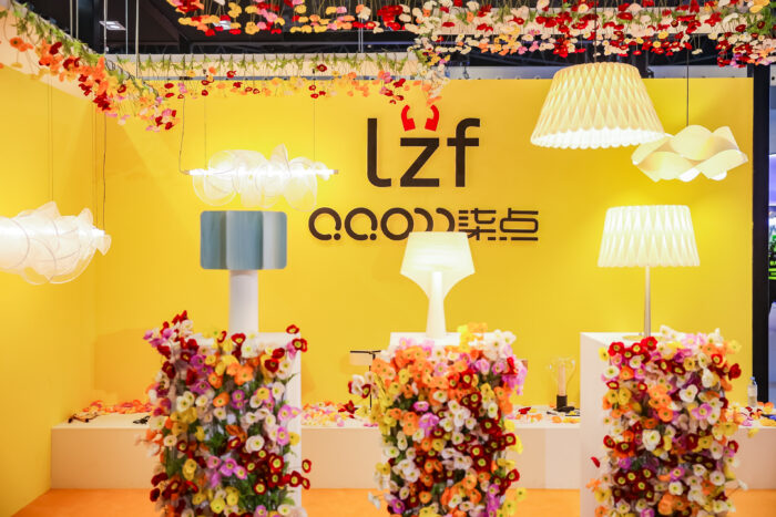 A colourful, floral-inspired stand at the Shanghai fair, where we presented our most iconic models handmade from natural wood veneer.
